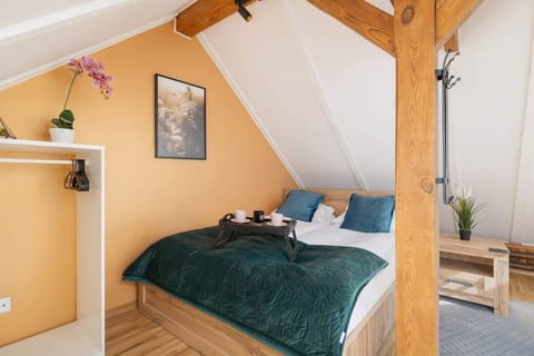 The bedroom's elegant decor creates a serene and restful environment.