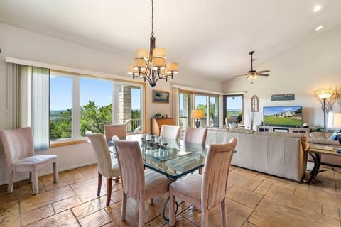 Gather for meals while enjoying panoramic Lake Travis views.