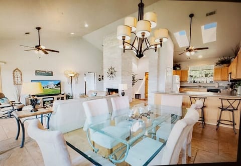 Open living room with dining and kitchen