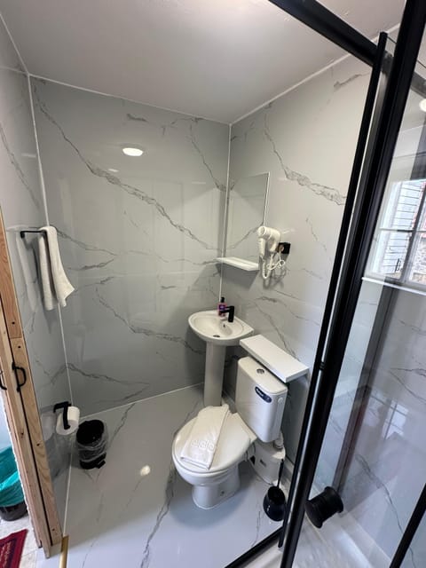 Deluxe Double Room, City View | Bathroom | Shower, hair dryer, towels, soap