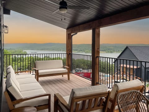 Unwind on the main level deck overlooking Table Rock Lake with the cozy outdoor seating