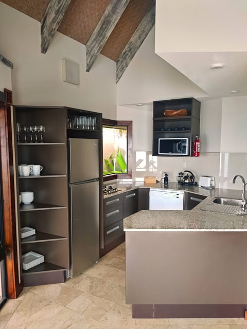 Luxury Villa, Private Pool, Beachfront | Private kitchen | Full-size fridge, microwave, stovetop, dishwasher