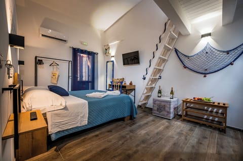 Deluxe Room, 1 Bedroom | 1 bedroom, down comforters, memory foam beds, individually decorated