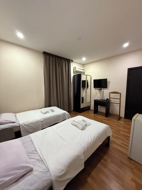 Premium bedding, minibar, desk, laptop workspace