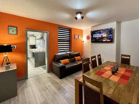 Family House | Living area | 55-inch Smart TV with digital channels, Netflix, streaming services