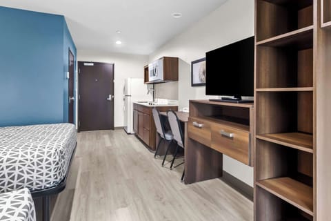 Suite, 2 Queen Beds, Non Smoking | Individually furnished, desk, laptop workspace, bed sheets