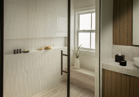 Designer toiletries, hair dryer, bathrobes, slippers