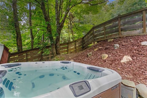 Relax in the Hot Tub in the Backyard