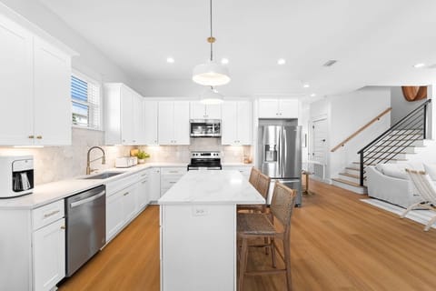 The extensive kitchen island adds additional seating.