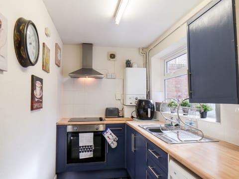 Fridge, electric kettle, toaster, cookware/dishes/utensils