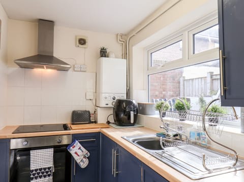 Fridge, electric kettle, toaster, cookware/dishes/utensils