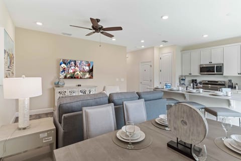 Sleek dining area of the cottage in Kissimmee Florida - Every meal becomes a celebration of togetherness - Chic design and comfortable - Seamless connection to kitchen and living area
