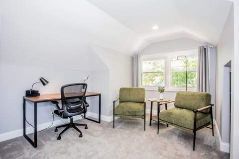 The bedroom has a full desk as well for those who need a place to work