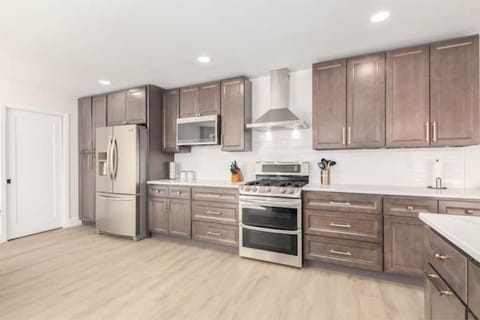 Plenty of prep space for every chef in the house. (Door leads to laundry/garage)