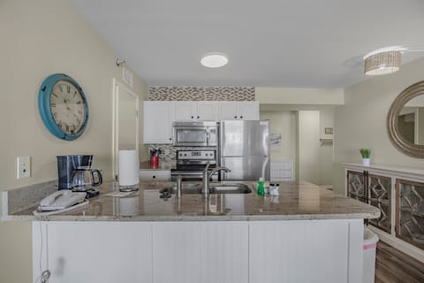 Kitchen stocked with pots/pans/utensils