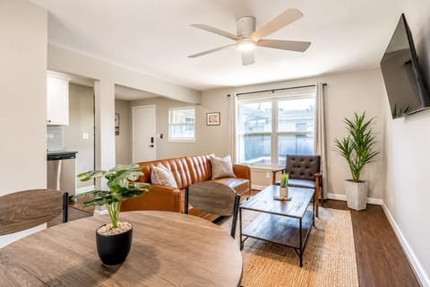 Spacious living area connected to the kitchen, great for cozy nights in or cooking together.