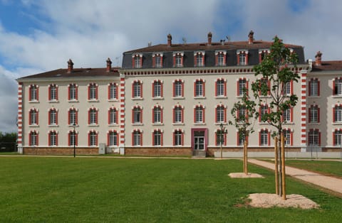 Admire the inviting façade, featuring classic architecture with vibrant detailing that echoes rich history.