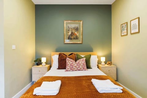 Bedroom 1 offers flexibility and comfort with a cosy double bed, a study area, a smart TV and ensuring a restful retreat for a peaceful night's sleep.