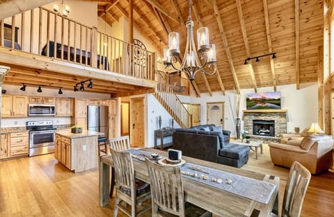 Open consent dining room with A/framed wooden ceiling