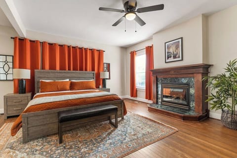 Primary Bedroom: Indulge in luxury with a king bed and elegant gas fireplace for warm evenings!