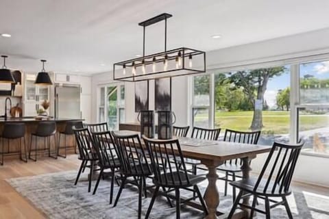 Restoration hardware 111" dining-room table, seats 10 comfortably with extra chairs provided. 