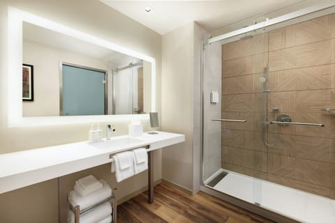 Deluxe Room, 2 Queen Beds, City View | Bathroom | Hair dryer, towels, soap, shampoo