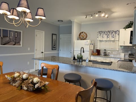 Beautiful table and new kitchen.