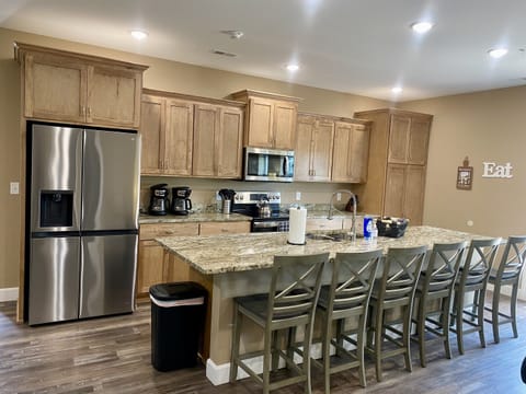 Granite,Refrigerator/Freezer,Stove/Double Oven,Microwave,2 Dishwashers,Garbage Disp.,2 Coffee Makers, Ninja Blender, Griddle, CrockPots, Almost every kitchen implement needed to make a meal.