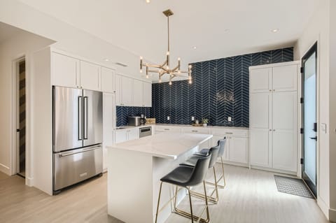 Brand new wet bar equipped with most basic utensils.