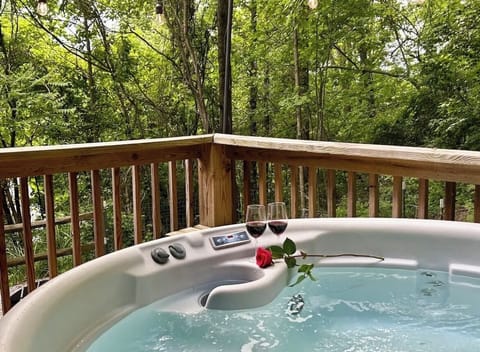 Enjoy a romantic time and bask in nature soaking in the hot tub