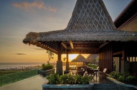 Outdoor pool, open 7:00 AM to 7:00 PM, pool umbrellas, sun loungers