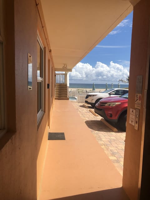 View from outside your door to the pool and beach