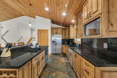 The beautiful kitchen has everything you need to prepare a meal for your group with stainless steel appliances and a full range of cookware.