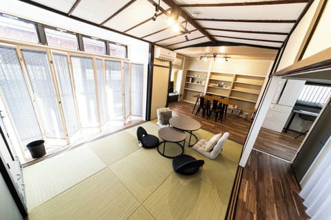 Comfort House | Living area | 50-inch flat-screen TV with digital channels
