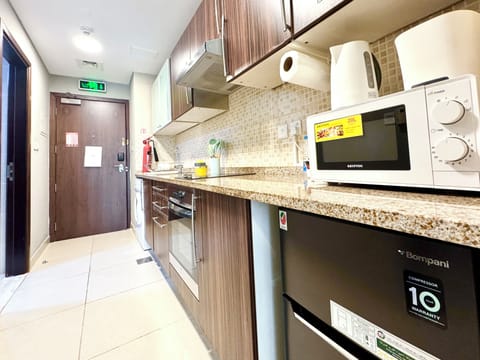 Superior Studio | Private kitchen | Full-size fridge, microwave, oven, electric kettle