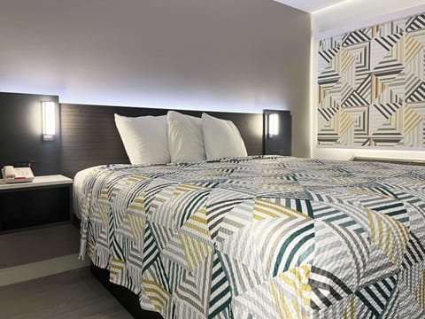 Blackout drapes, free WiFi, bed sheets