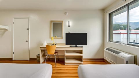 Individually furnished, desk, laptop workspace, blackout drapes