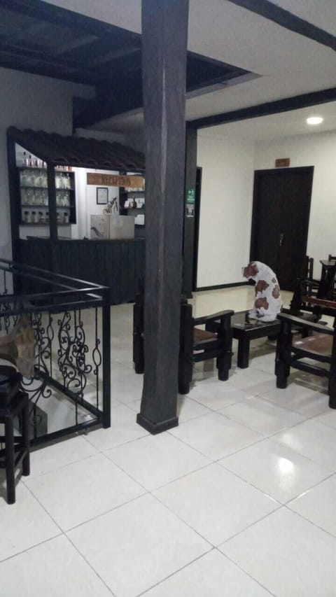 Family Triple Room | Living area | 32-inch flat-screen TV with cable channels