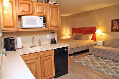 King bed, trundle, kitchenette stocked with basic essentials. Coffee provided