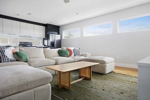 Cozy textures and morning light create a perfect lounge vibe.