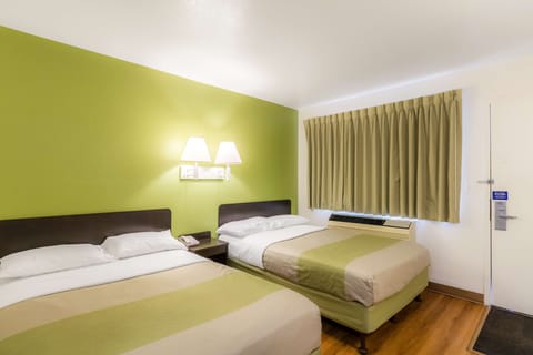 Desk, laptop workspace, free WiFi, bed sheets