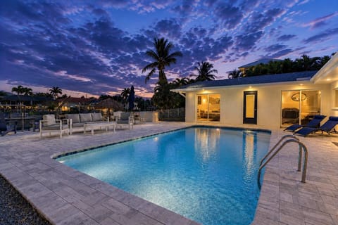Twilight swims, waterfront breezes, and laid-back evenings under the palms await you in this Cape Coral retreat.