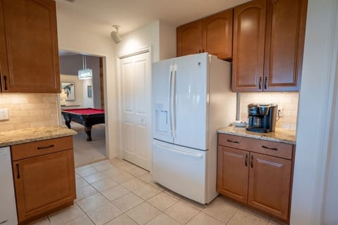 Morning cup of Joe, anyone? In the background you see a peak of the billiards room