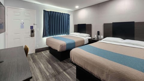 Desk, laptop workspace, WiFi (free), bed sheets