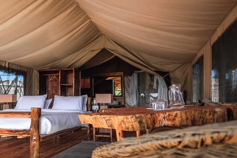 Deluxe Tent | Down comforters, memory foam beds, in-room safe, individually furnished
