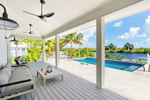 Veranda lounge overlooking the villa's private freshwater pool. 