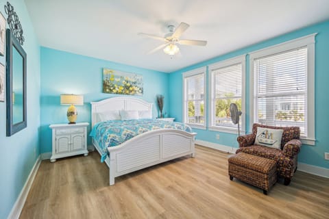 Master bedroom with a private balcony.