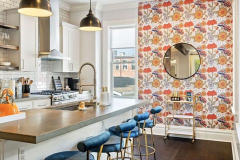 Beverage cart with hanging mirror available in the kitchen