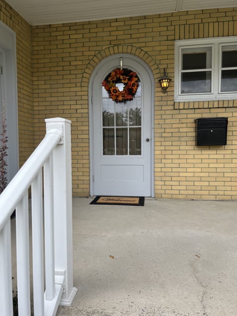 Front entrance has cool rounded doors.