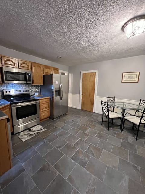 Enjoy cooking in the large , updated eat-in kitchen.